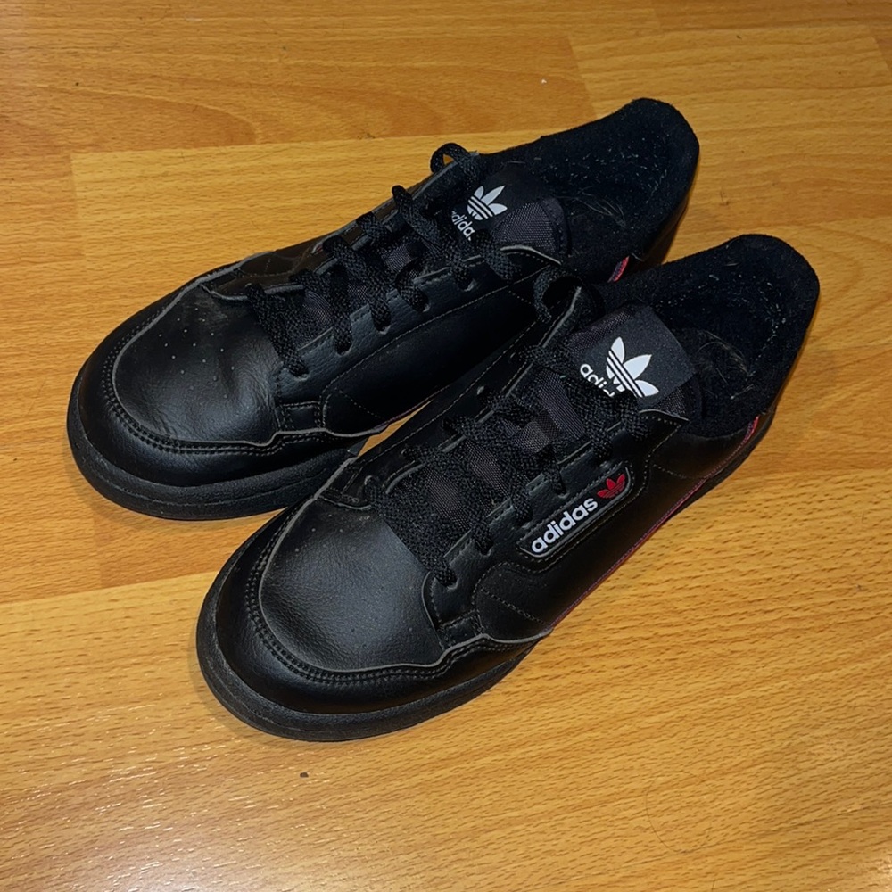 Sleek black Adidas sneakers. Orthopedic soles
